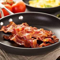 Cooked,Sizzling,Hot,Tasty,Crispy,Bacon,On,A,Skillet,And